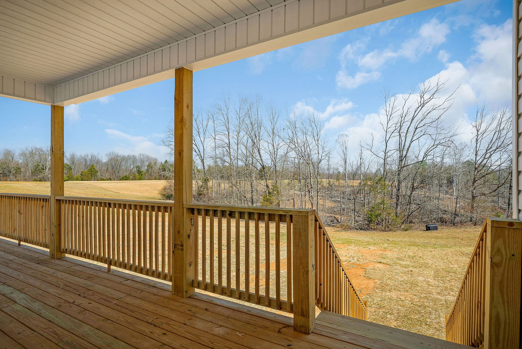 172 Johnson Chapel Road Sparta, TN 38583 - Photo 4 of 38 a view of a balcony with wooden floor and fence