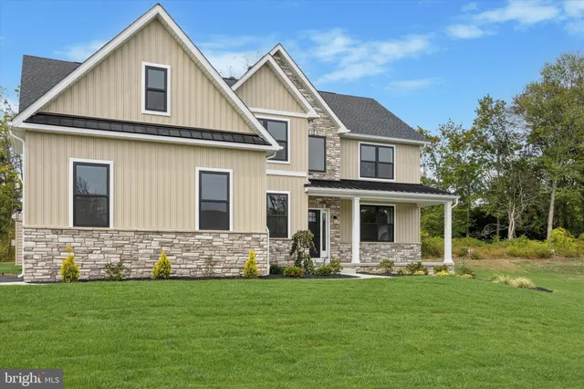 a front view of house with yard
