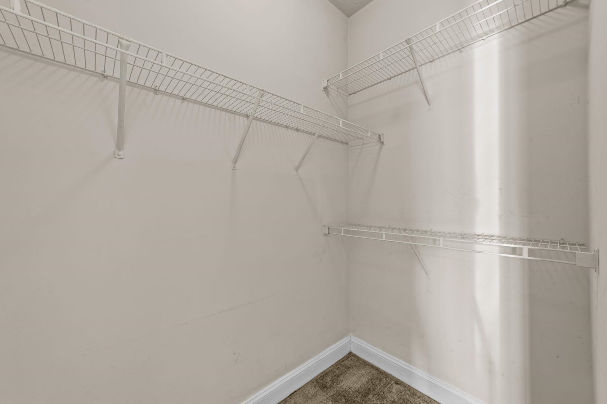 120 Fountain Pointe Lane, Unit 103 Myrtle Beach, SC 29579 - Photo 17 of 26 Walk in closet featuring carpet