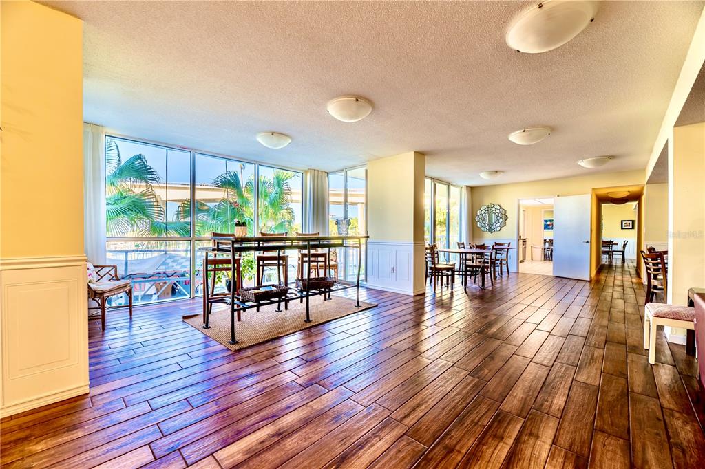 100 Pierce Street, Unit 1102 Clearwater, FL 33756 - Photo 29 of 45 a living room with furniture and a wooden floor