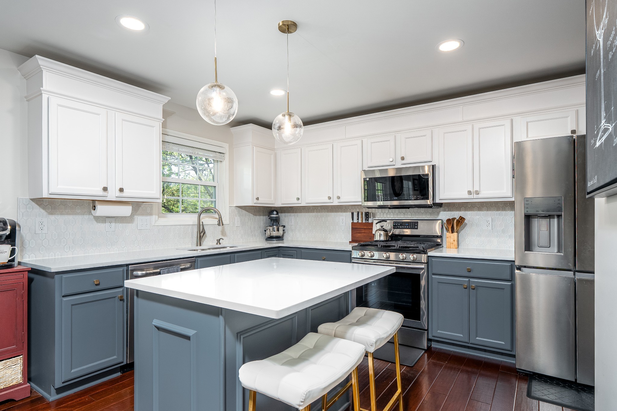 2102 Burgess Lane Spring Hill, TN 37174 - Photo 4 of 45 a kitchen with a sink a counter space appliances and cabinets