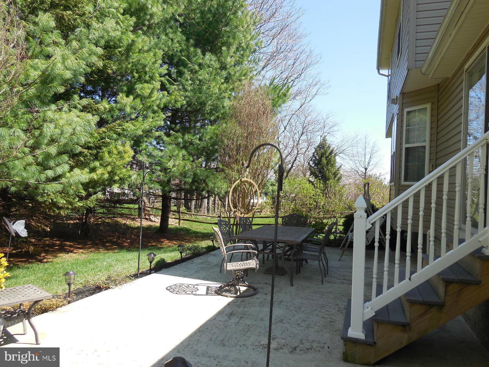 1950 Timber Grove Road Frederick, MD 21702 - Photo 7 of 30 Relax on the Patio in a Park Like Setting