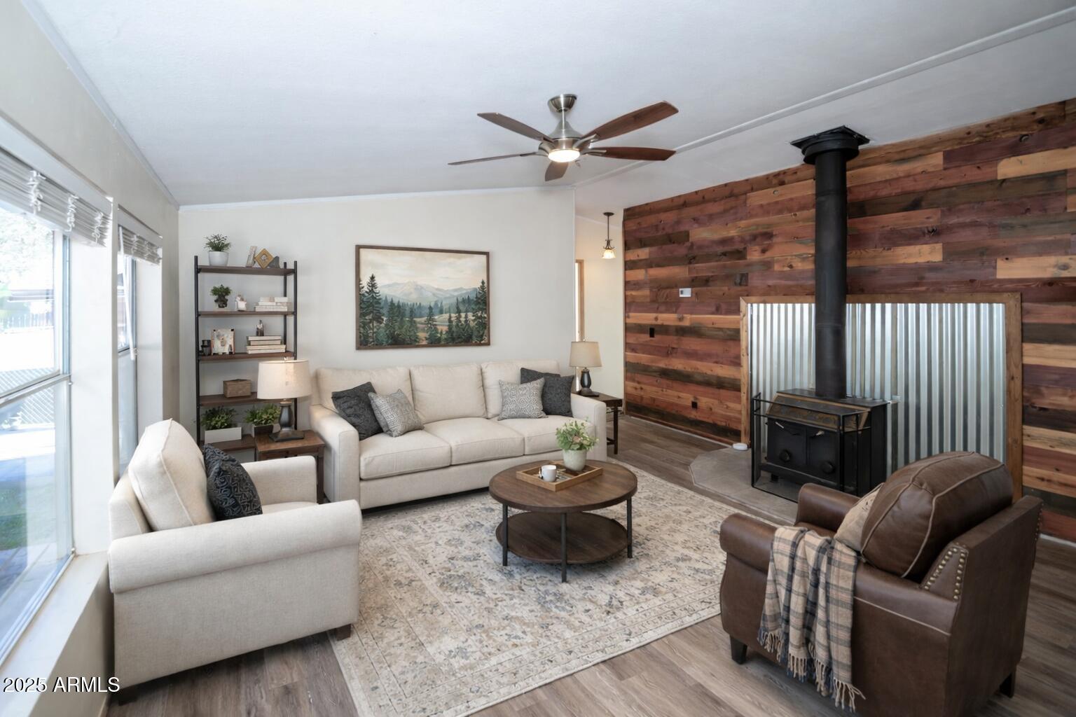 221 Standage Drive Payson, AZ 85541 - Photo 11 of 27 a living room with furniture a ceiling fan and a window