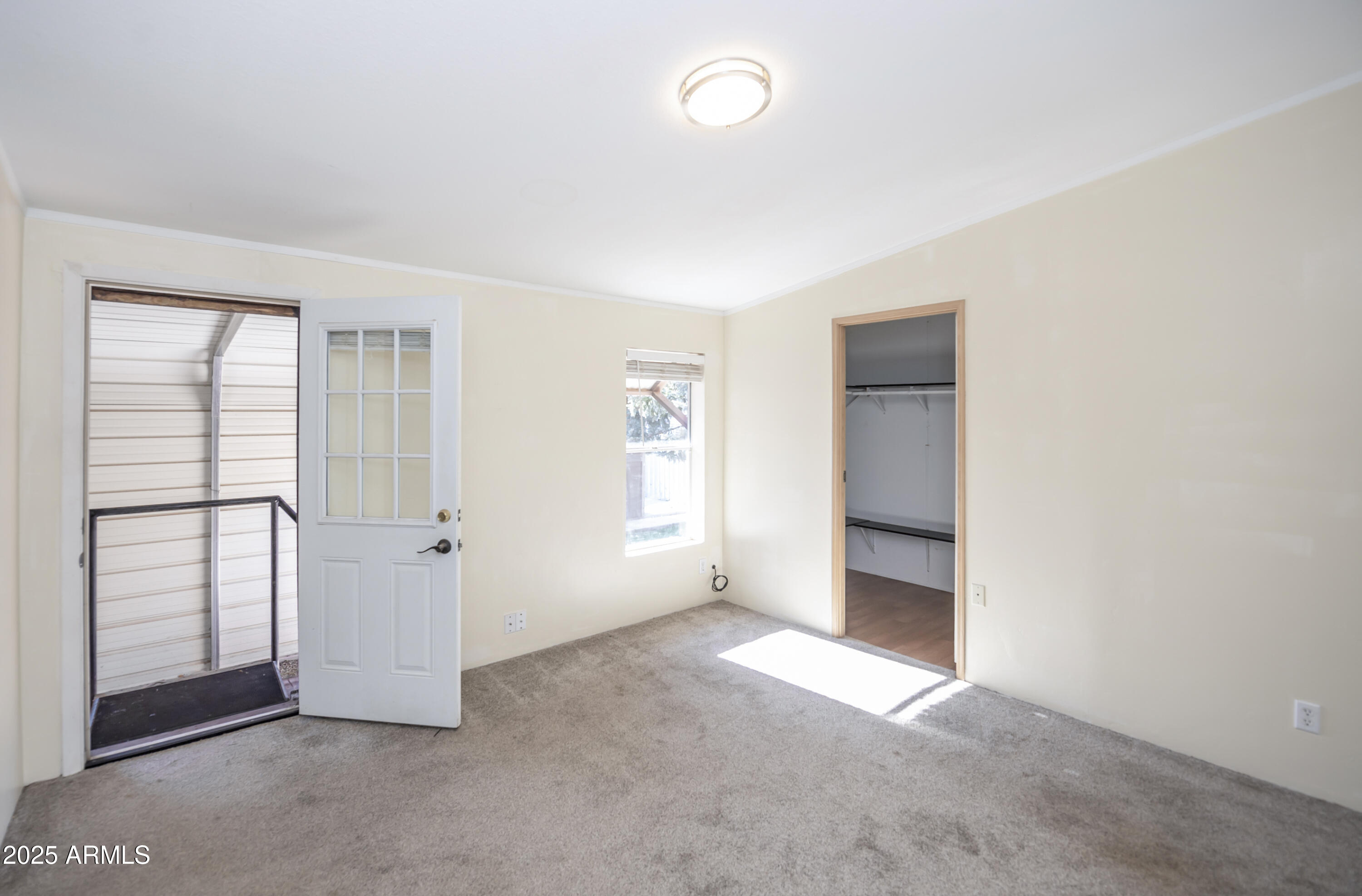 221 Standage Drive Payson, AZ 85541 - Photo 13 of 27 an empty room with windows and closet