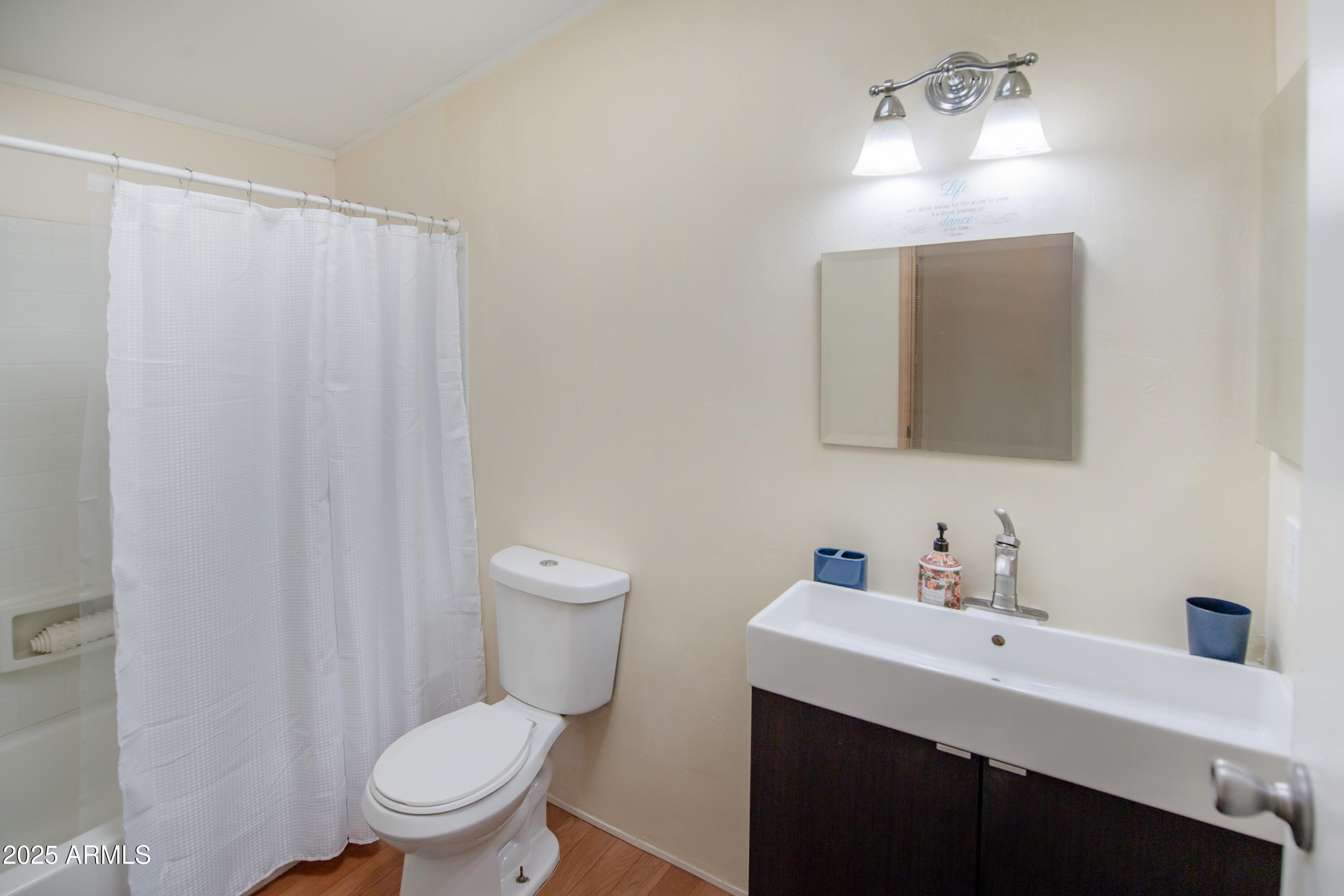 221 Standage Drive Payson, AZ 85541 - Photo 20 of 27 a bathroom with a toilet a sink and mirror
