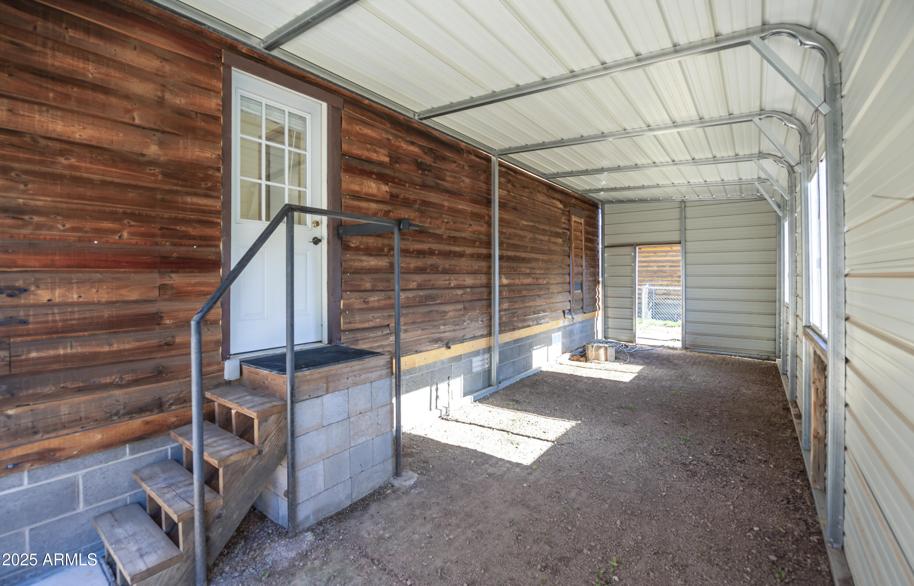 221 Standage Drive Payson, AZ 85541 - Photo 21 of 27 a view of backyard with a large tree and wooden roof