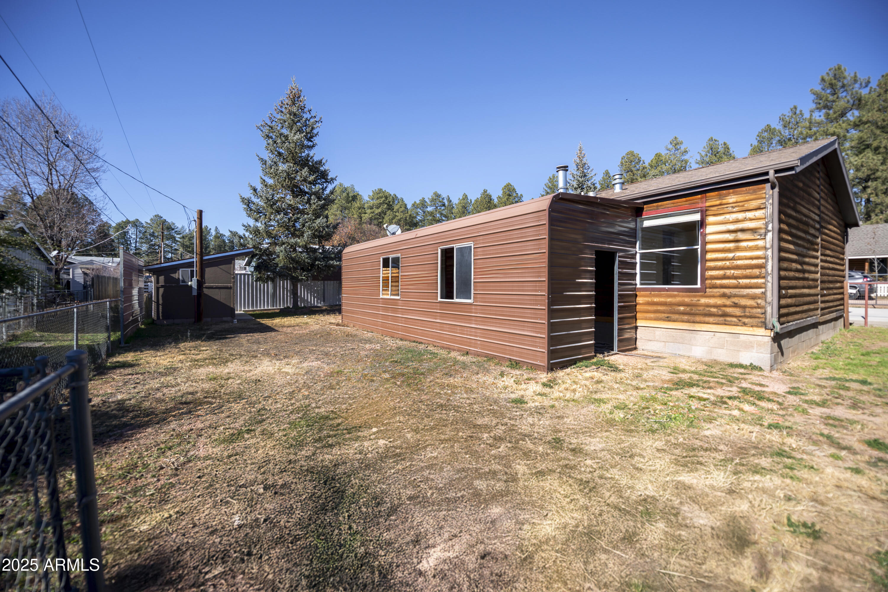 221 Standage Drive Payson, AZ 85541 - Photo 24 of 27 a view of a house with a yard