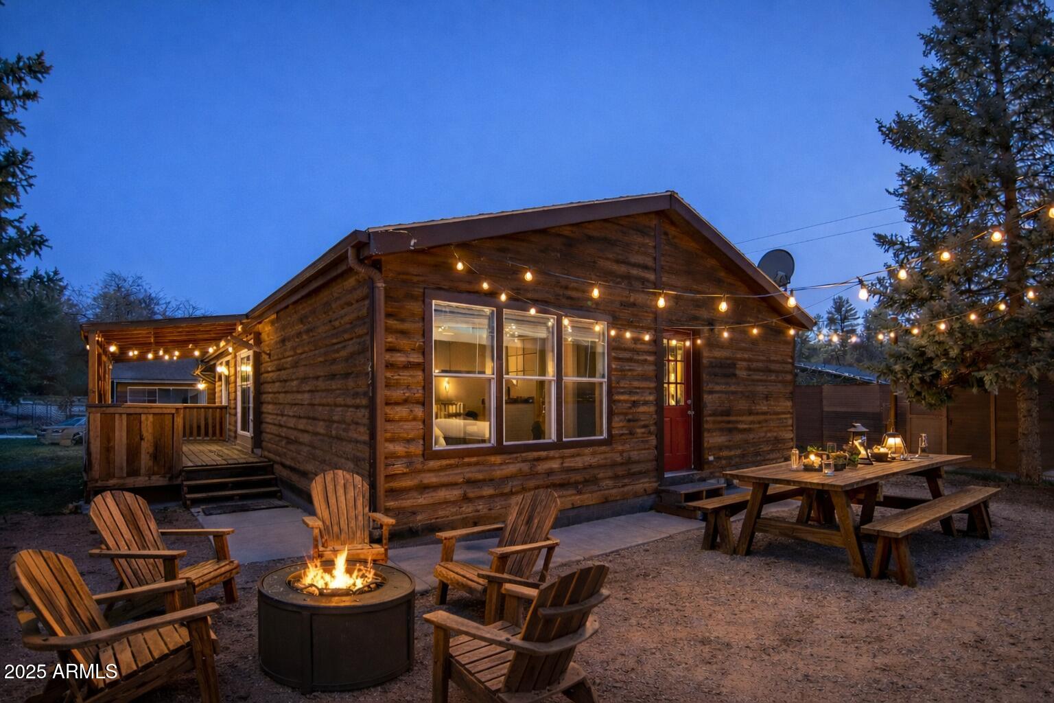 221 Standage Drive Payson, AZ 85541 - Photo 3 of 27 a backyard of a house with fire pit and outdoor seating