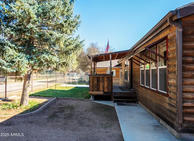 a house view with a backyard space