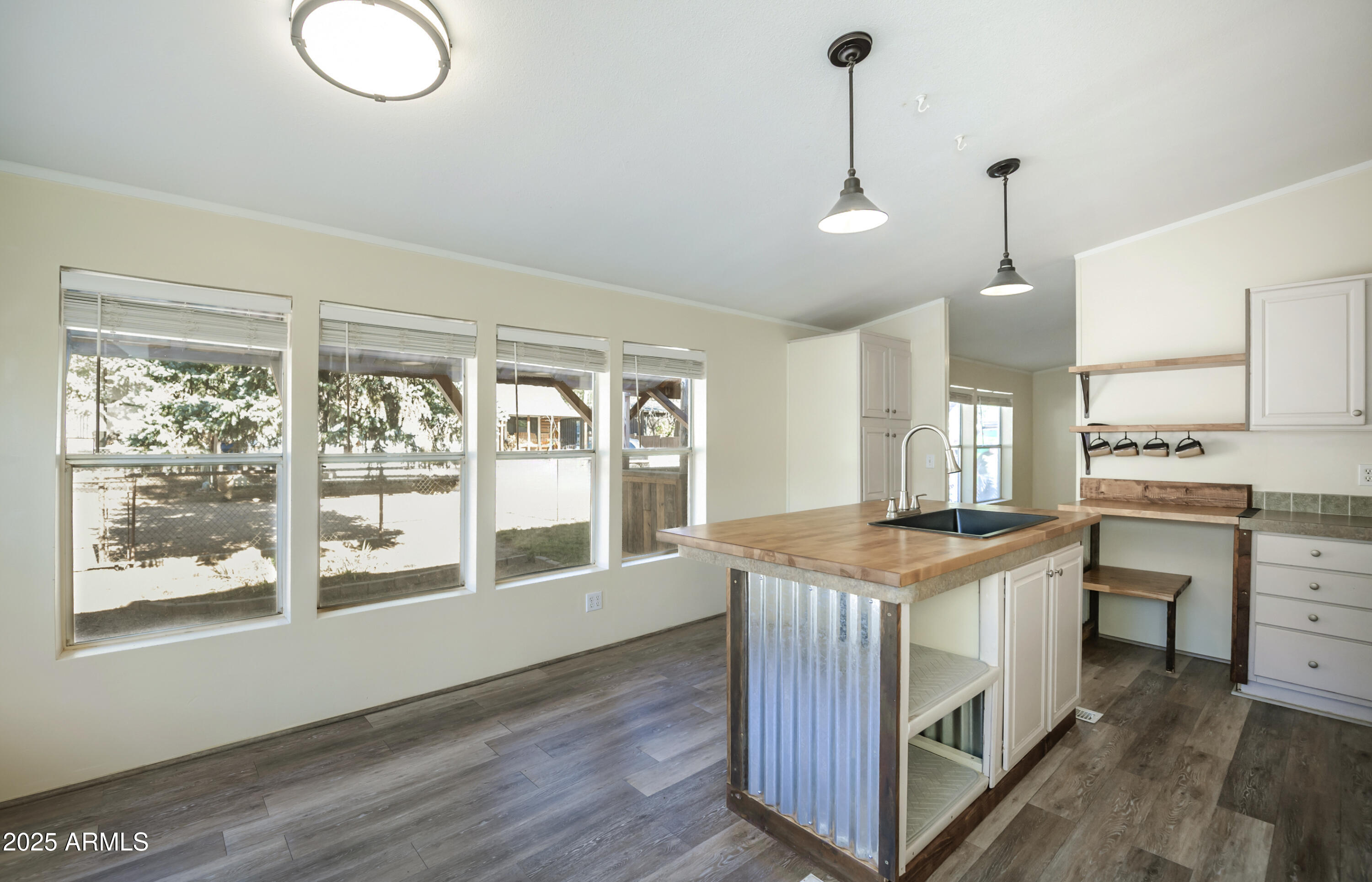 221 Standage Drive Payson, AZ 85541 - Photo 9 of 27 a kitchen that has a lot of cabinets in it