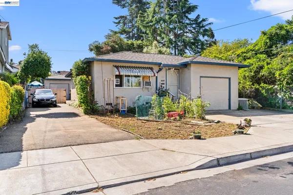 front view of a house with a patio