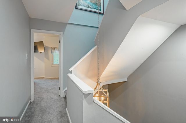 a view of hallway with stairs