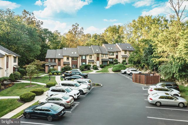 a car parked in front of a house