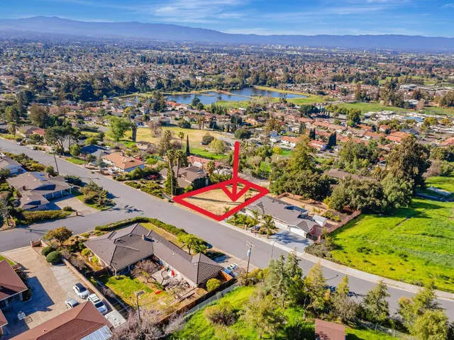 an aerial view of a city with lots of residential buildings