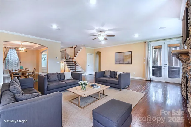 an aerial view of a house with outdoor space and a lake view