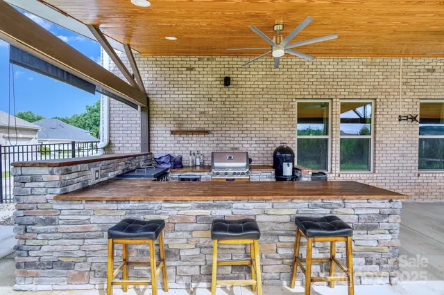 a view of a house with a patio