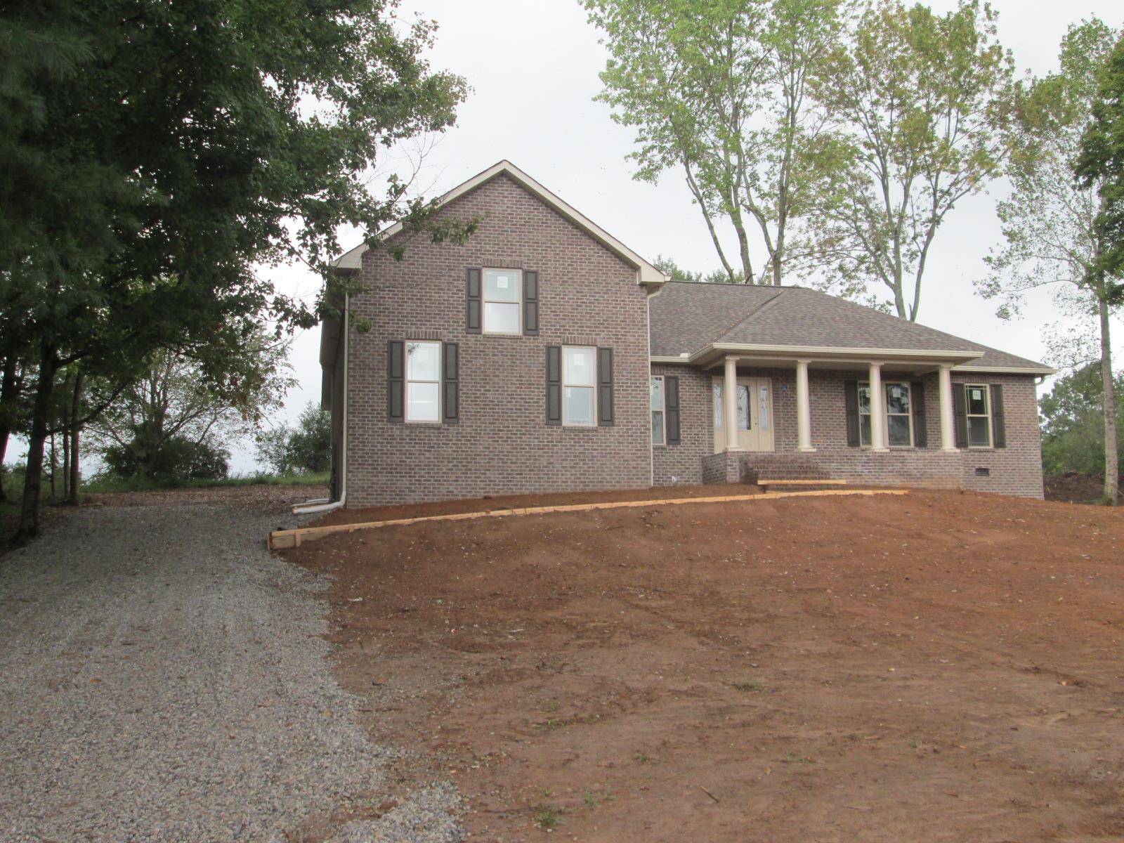 3543 Forest Park Road Springfield, TN 37172 - Photo 7 of 28 a front view of a house with a garden