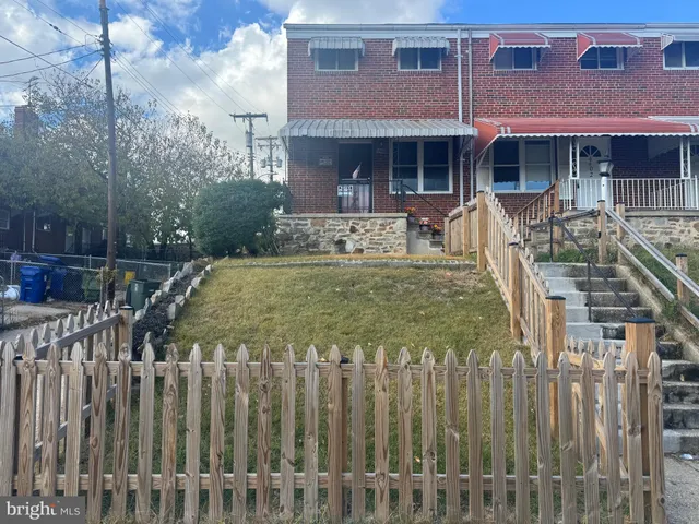 a front view of a house with swimming pool