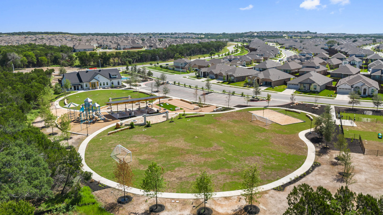 2564 Whittler Road Leander, TX 78641 - Photo 27 of 35 an aerial view of a swimming pool with a table and chairs