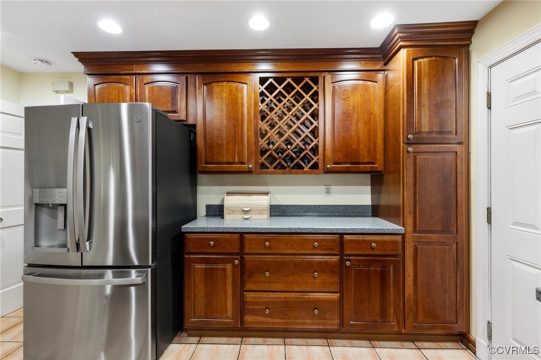 4018 Timber Ridge Road Midlothian, VA 23112 - Photo 13 of 43 a kitchen with stainless steel appliances granite countertop a refrigerator and a sink
