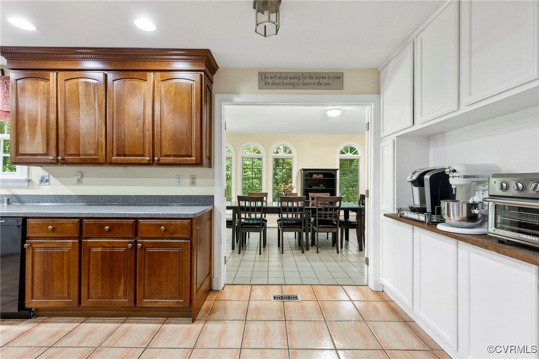 4018 Timber Ridge Road Midlothian, VA 23112 - Photo 21 of 43 a kitchen with stainless steel appliances granite countertop a stove a sink and a microwave