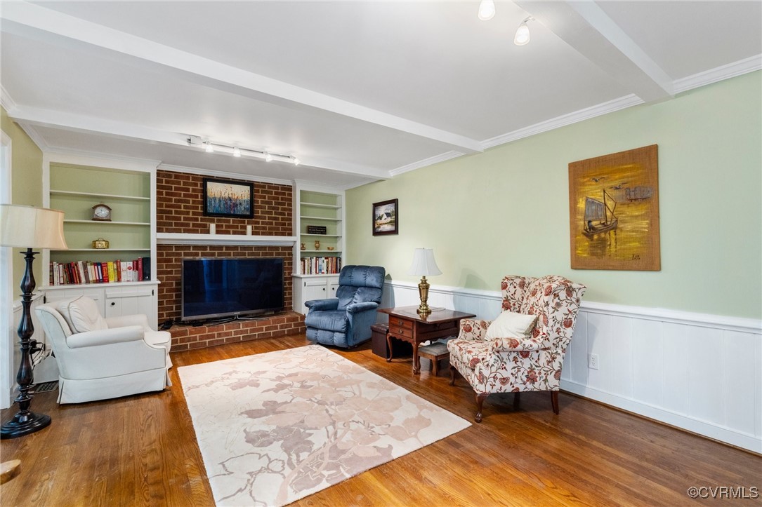 4018 Timber Ridge Road Midlothian, VA 23112 - Photo 23 of 43 a living room with furniture flat screen tv and a fireplace