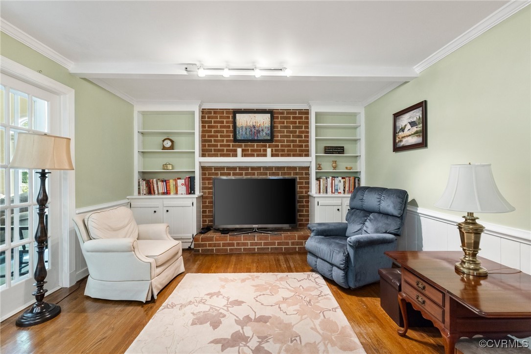 4018 Timber Ridge Road Midlothian, VA 23112 - Photo 24 of 43 a living room with furniture and a fireplace
