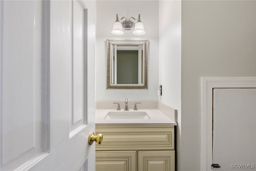 4018 Timber Ridge Road Midlothian, VA 23112 - Photo 26 of 43 a bathroom with a sink and a mirror