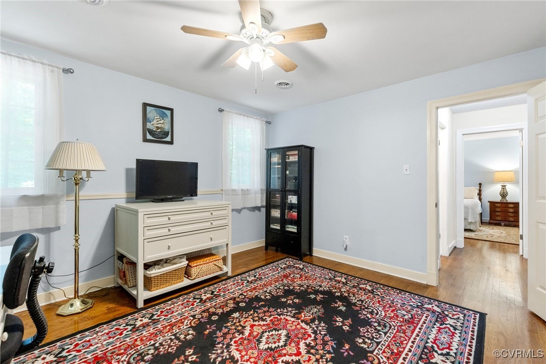 4018 Timber Ridge Road Midlothian, VA 23112 - Photo 28 of 43 a bedroom with furniture and a flat screen tv