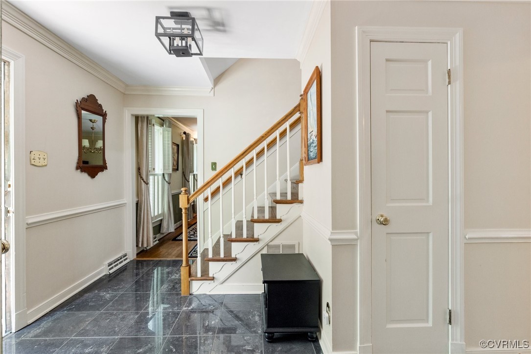 4018 Timber Ridge Road Midlothian, VA 23112 - Photo 3 of 43 a view of entryway and hall with a dining room