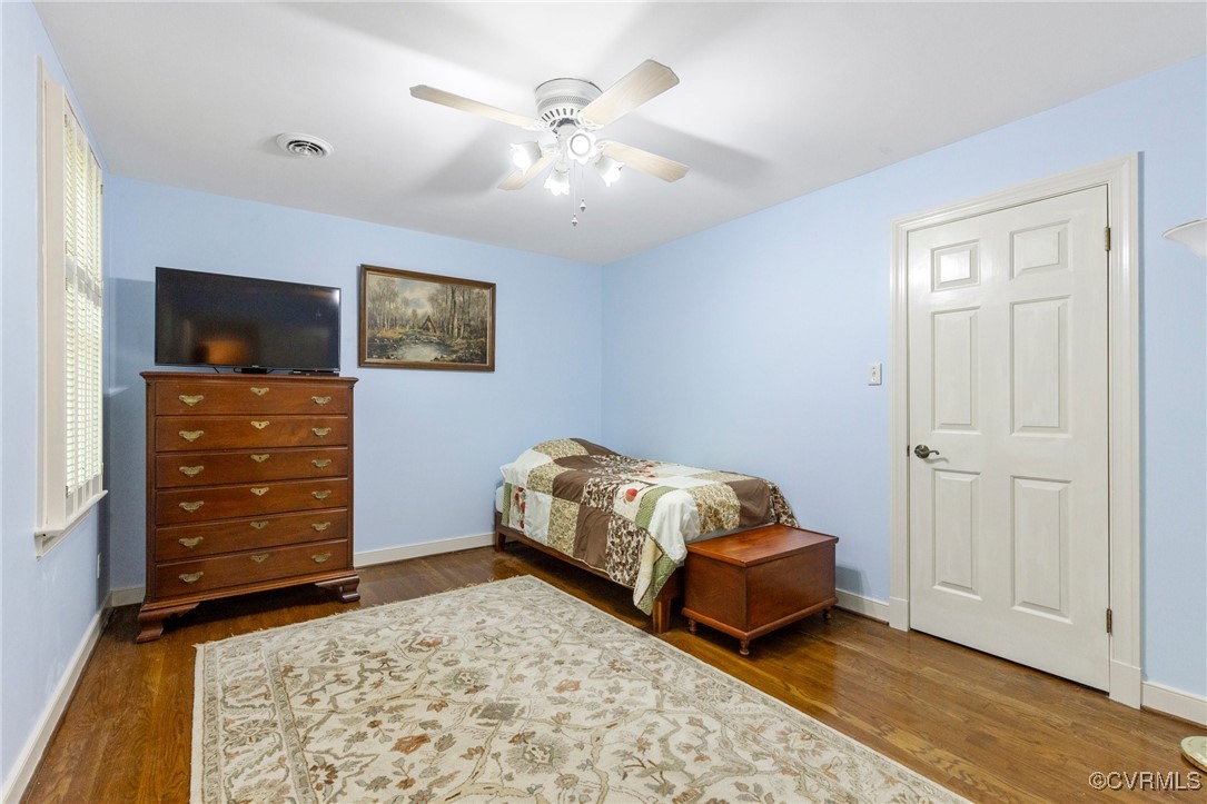 4018 Timber Ridge Road Midlothian, VA 23112 - Photo 31 of 43 a bedroom with a bed and a dresser