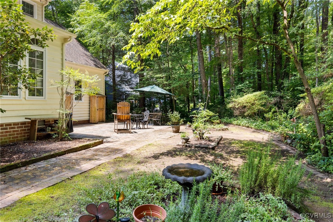 4018 Timber Ridge Road Midlothian, VA 23112 - Photo 41 of 43 a view of a house with backyard and sitting area