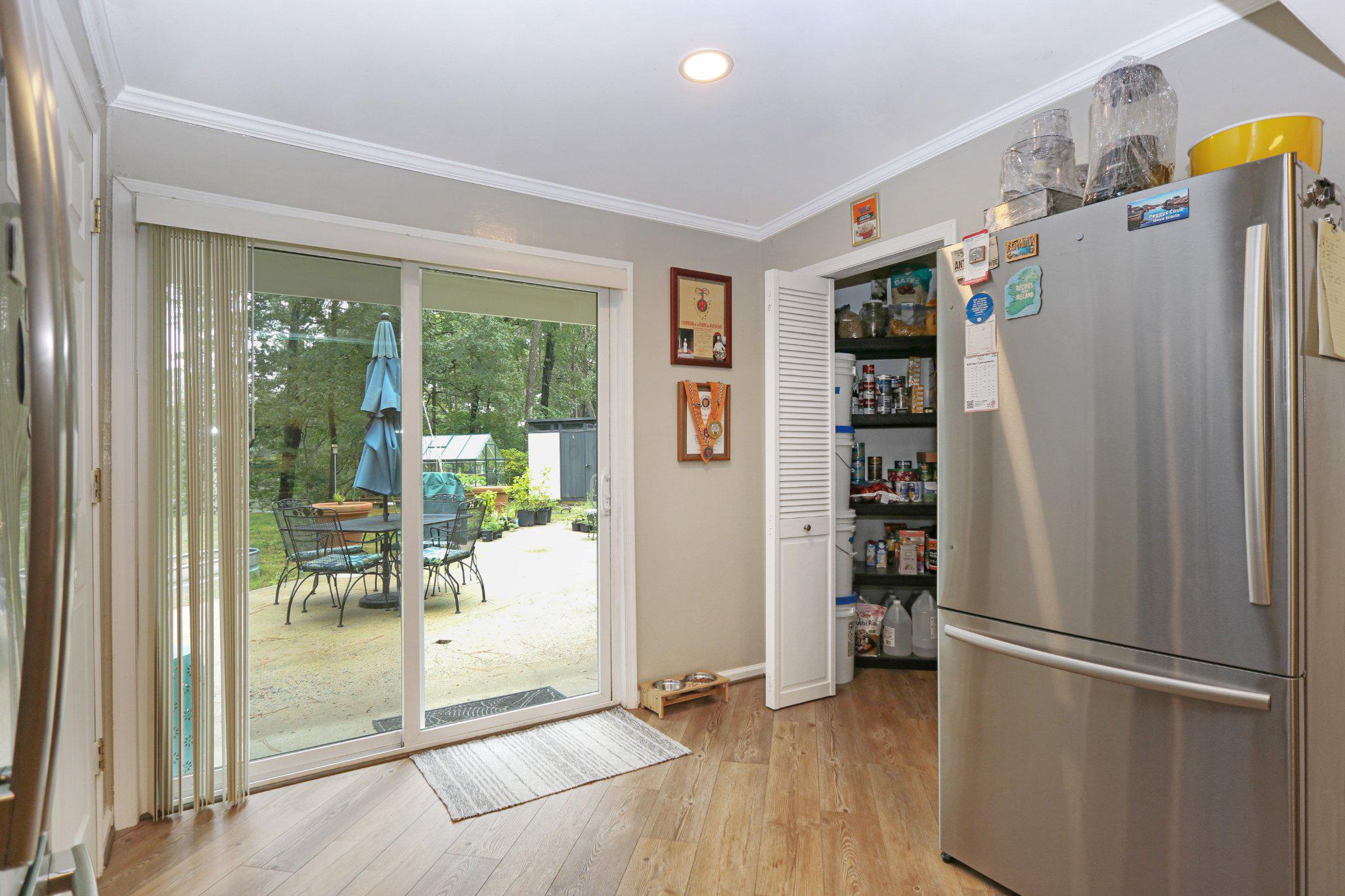 13431 Solitude Trail Machipongo, VA 23405 - Photo 16 of 32 Bright kitchen with outdoor access.