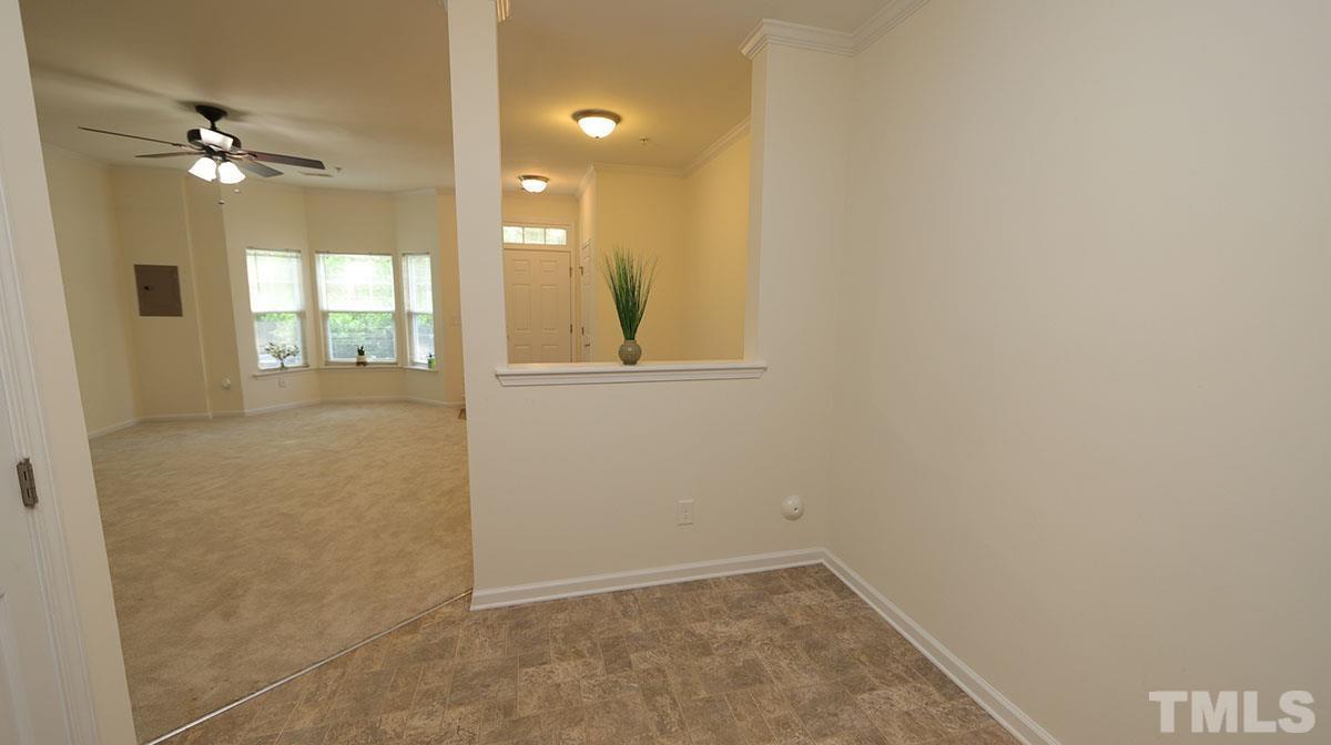 11710 Coppergate Drive, Unit 109 Raleigh, NC 27614 - Photo 7 of 15 wooden floor in an empty room