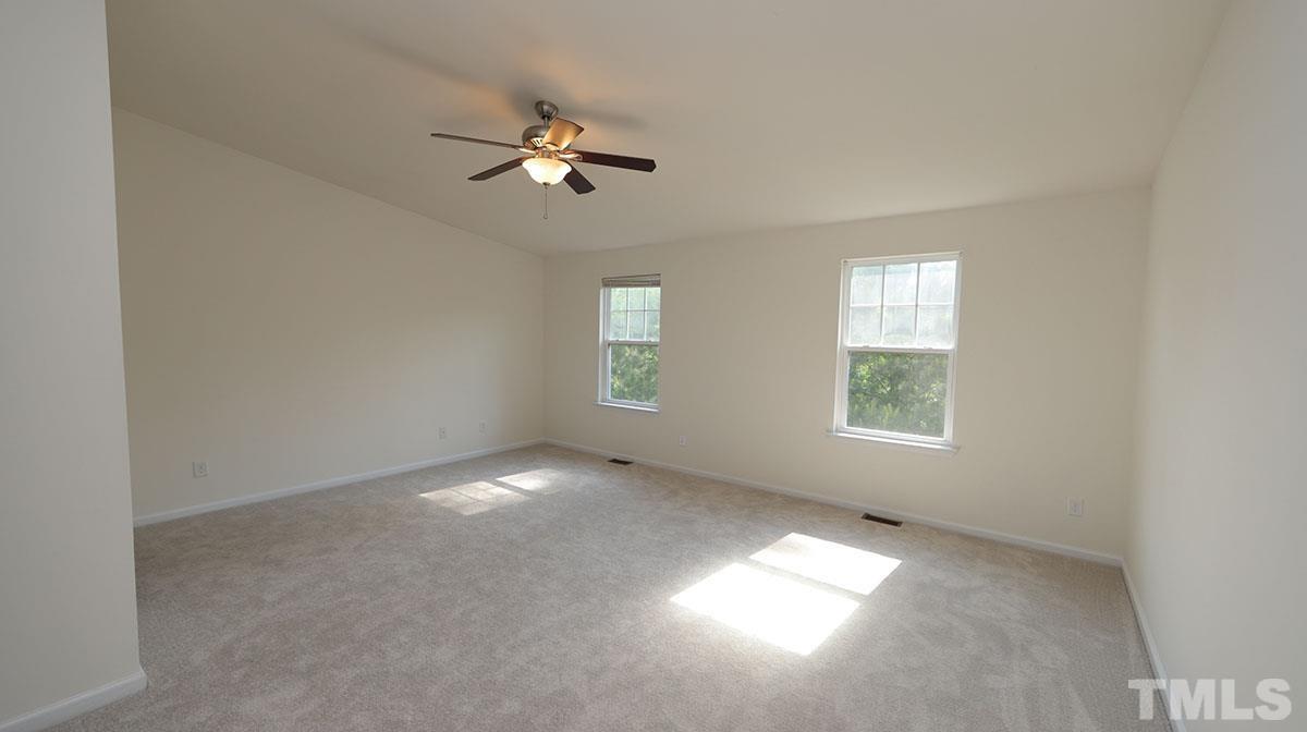 11710 Coppergate Drive, Unit 109 Raleigh, NC 27614 - Photo 8 of 15 a view of an empty room with a window