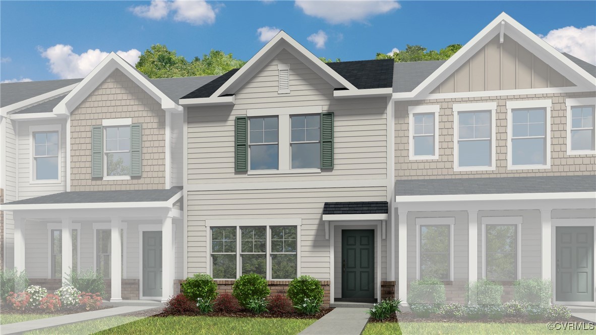 233 Greenpark Road Sandston, VA 23150 - Photo 2 of 30 a front view of a house with garden