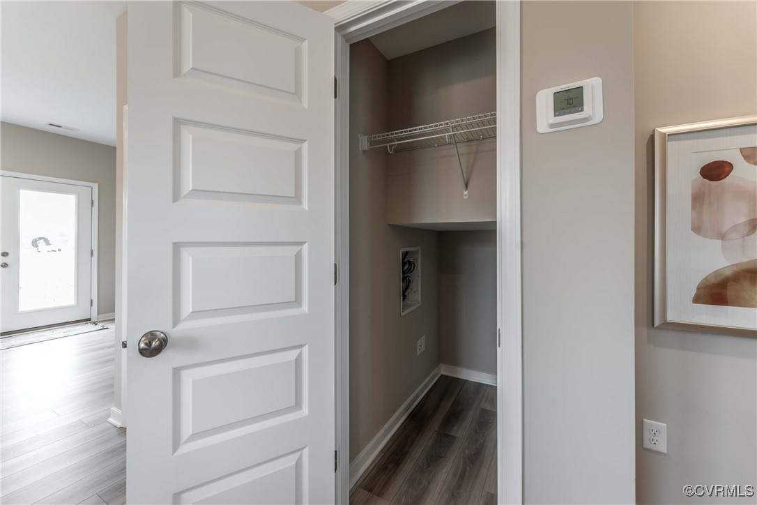 233 Greenpark Road Sandston, VA 23150 - Photo 7 of 30 a view of walk in closet with empty racks