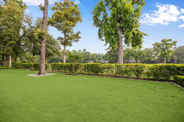 a view of a golf course with a lake