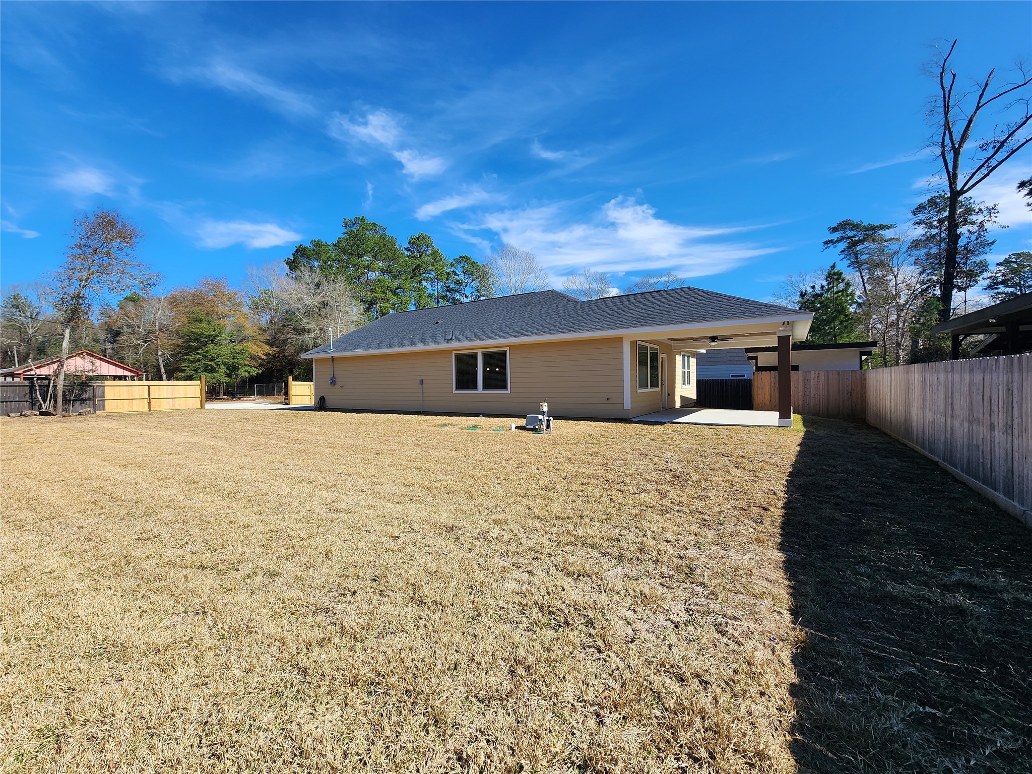 25982 Lantern Lane New Caney, TX 77357 - Photo 12 of 26 a front view of a house with a yard