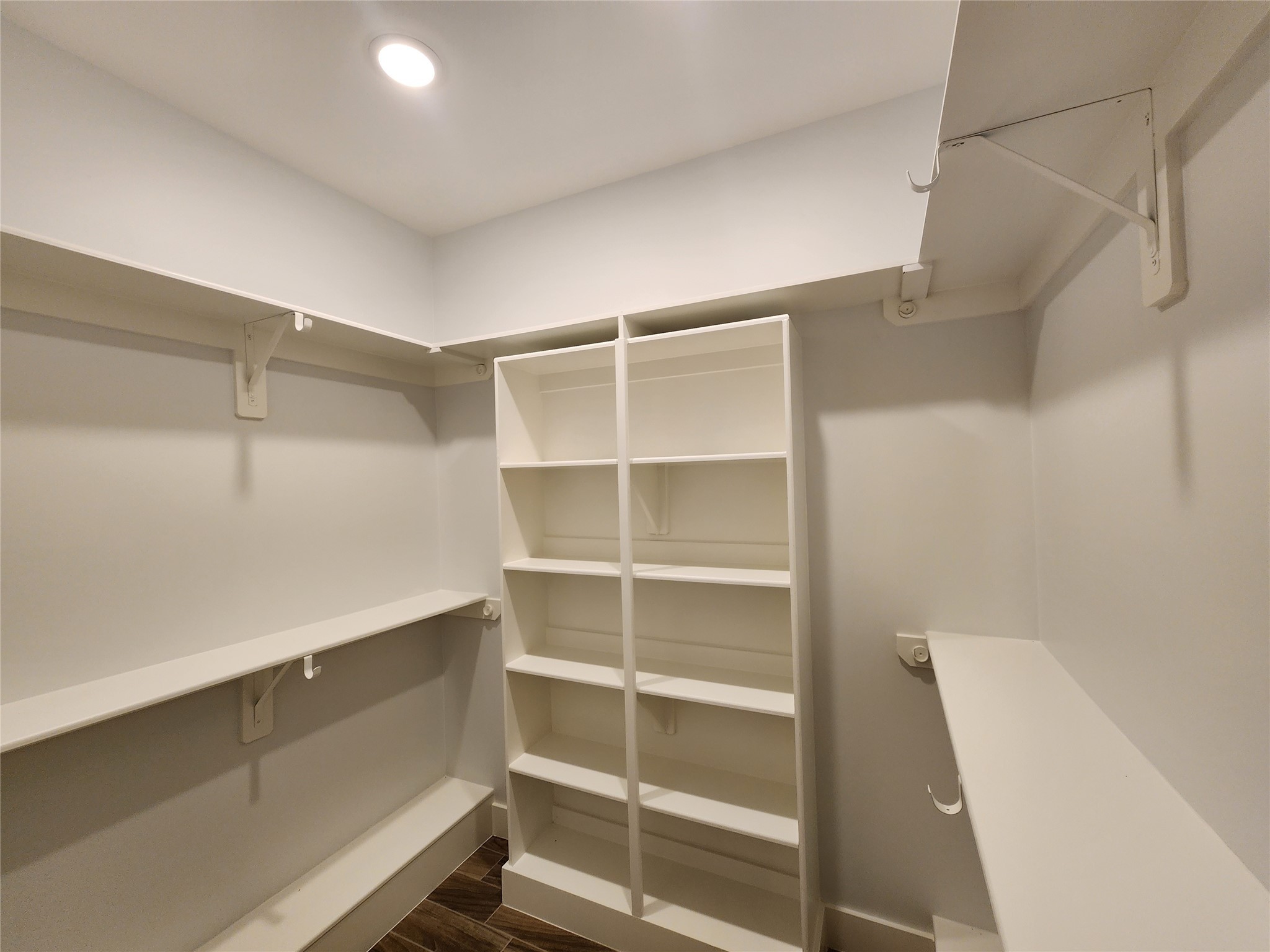 25982 Lantern Lane New Caney, TX 77357 - Photo 17 of 26 a view of walk in closet with empty racks