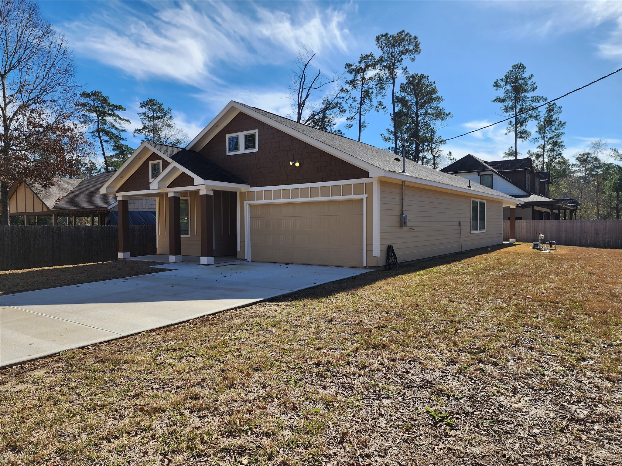 25982 Lantern Lane New Caney, TX 77357 - Photo 22 of 26 a front view of a house with a yard