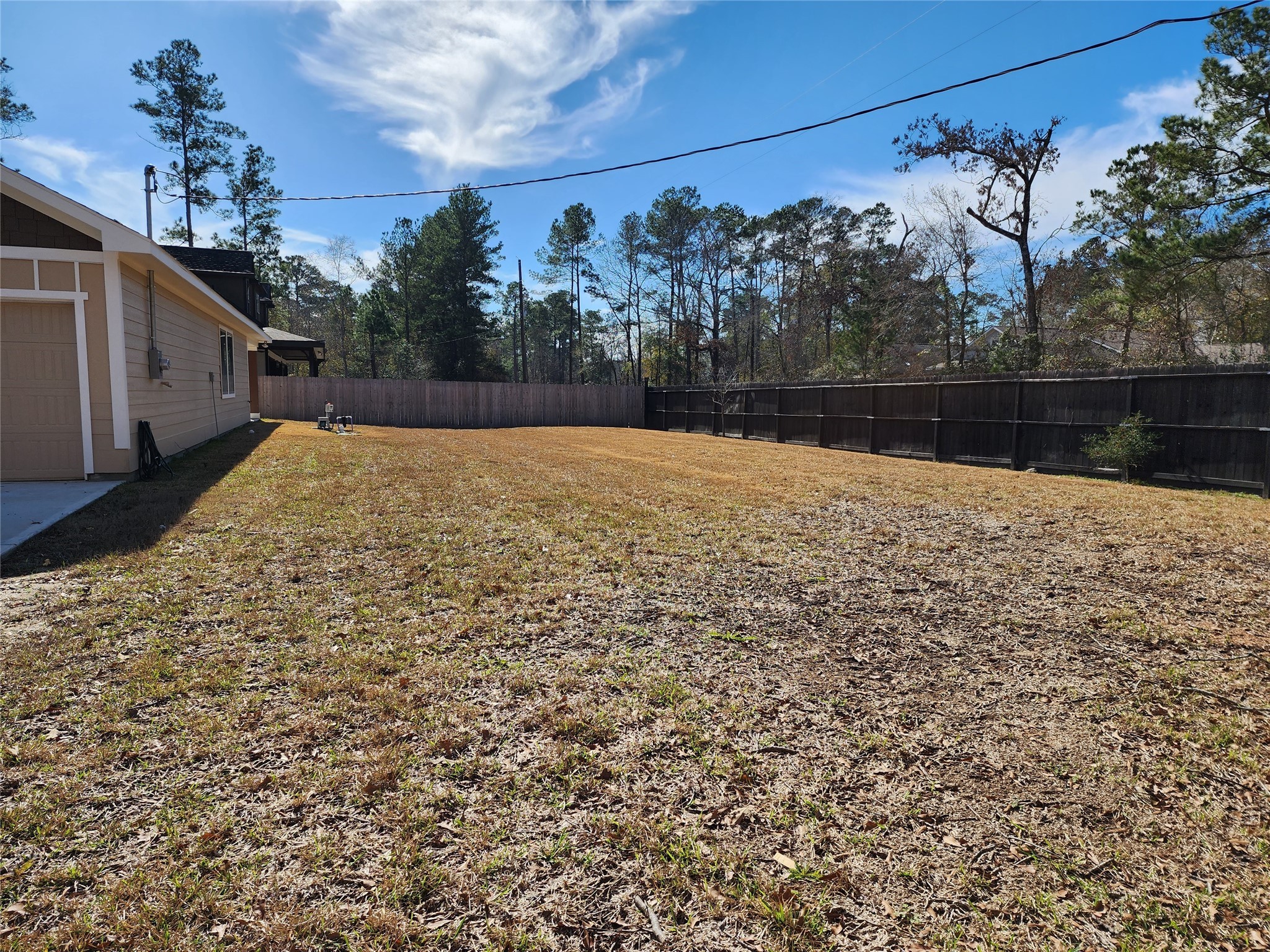 25982 Lantern Lane New Caney, TX 77357 - Photo 24 of 26 a view of a backyard of the house