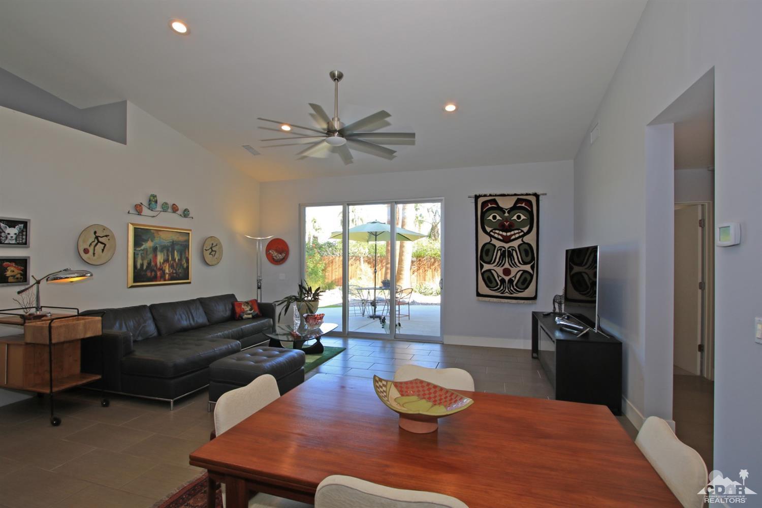 71728 Tunis Road Rancho Mirage, CA 92270 - Photo 15 of 44 a living room with furniture and a wooden floor