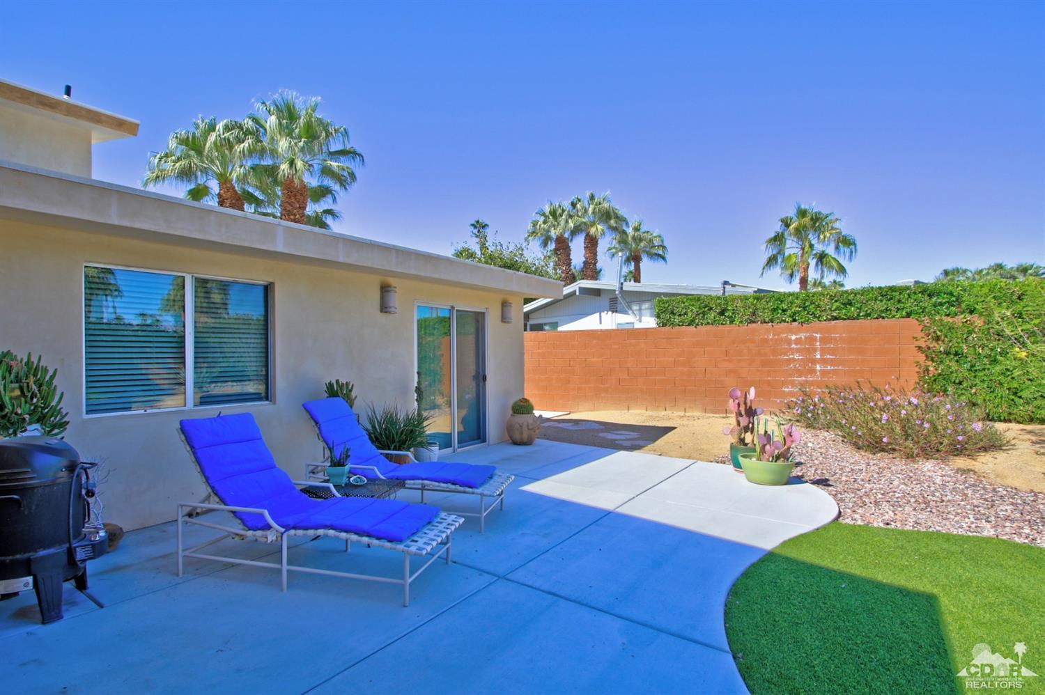 71728 Tunis Road Rancho Mirage, CA 92270 - Photo 35 of 44 a view of a table and chairs in patio