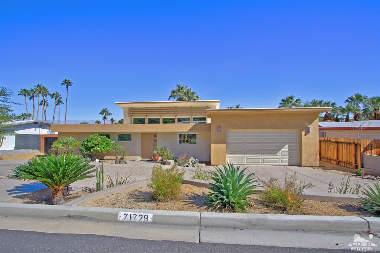 71728 Tunis Road Rancho Mirage, CA 92270 - Photo 38 of 44 a front view of a house with a yard
