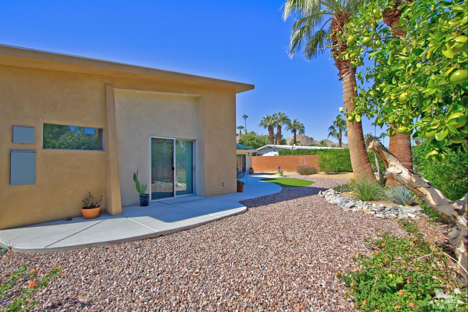 71728 Tunis Road Rancho Mirage, CA 92270 - Photo 41 of 44 a front view of a house with a yard