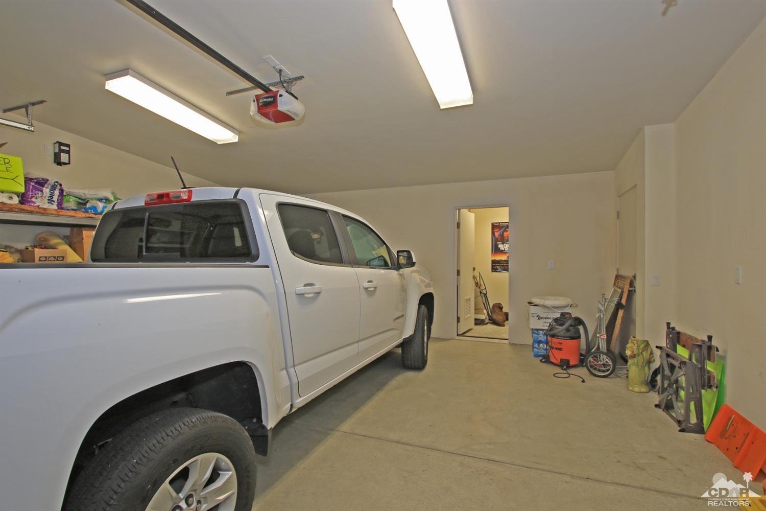 71728 Tunis Road Rancho Mirage, CA 92270 - Photo 43 of 44 a utility room with dryer and washer