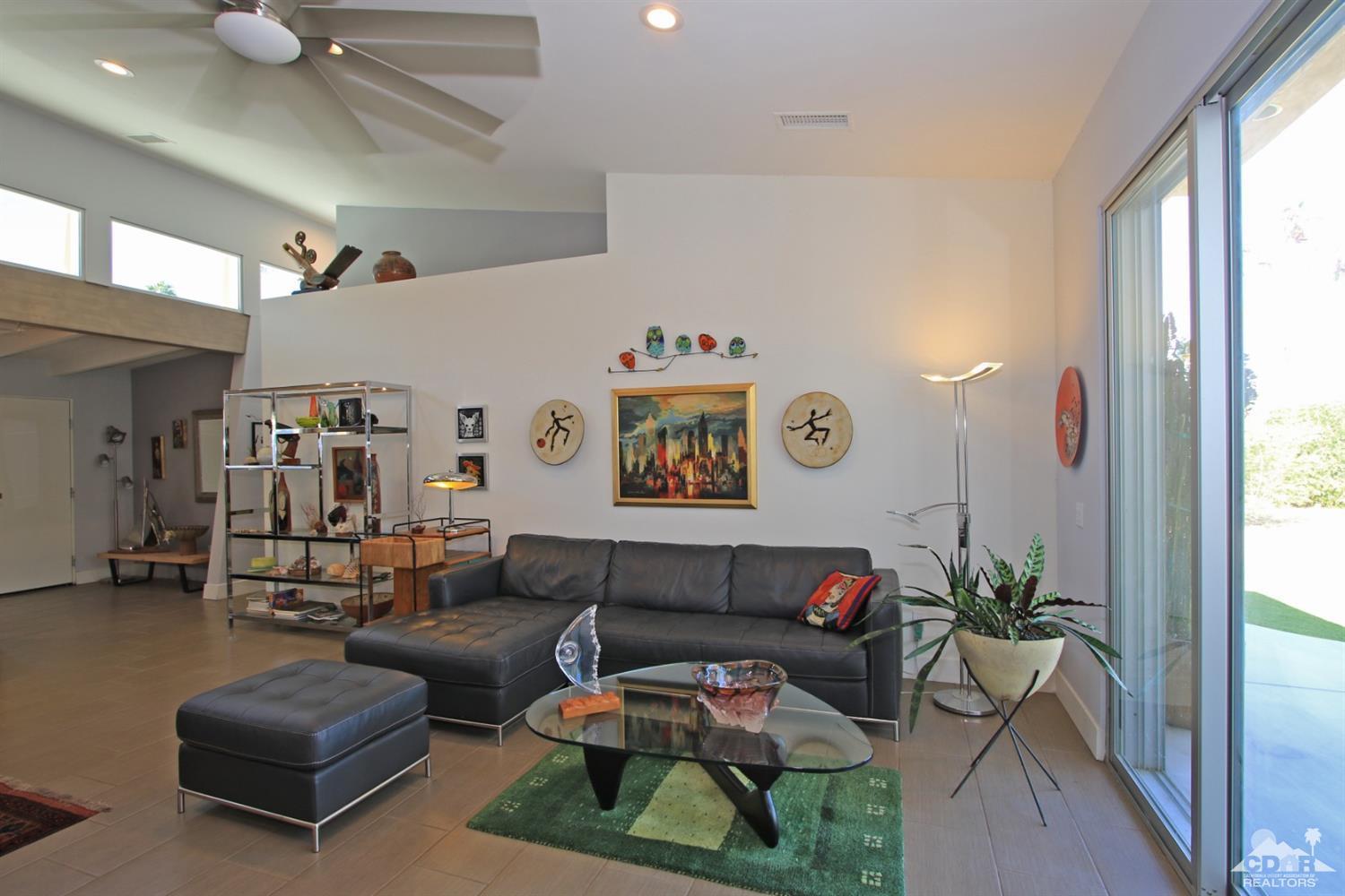 71728 Tunis Road Rancho Mirage, CA 92270 - Photo 9 of 44 a living room with furniture and a window