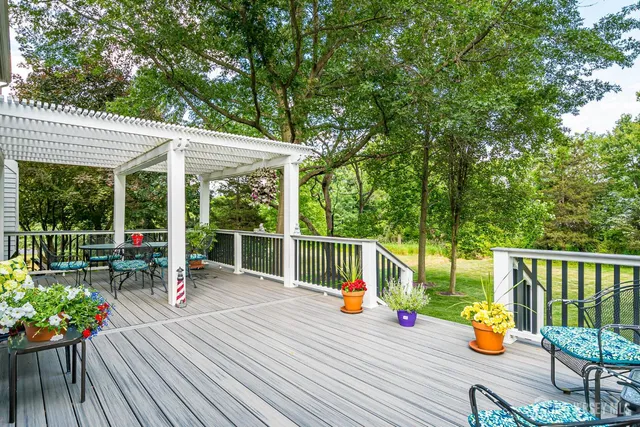 a living room with furniture and a lamp