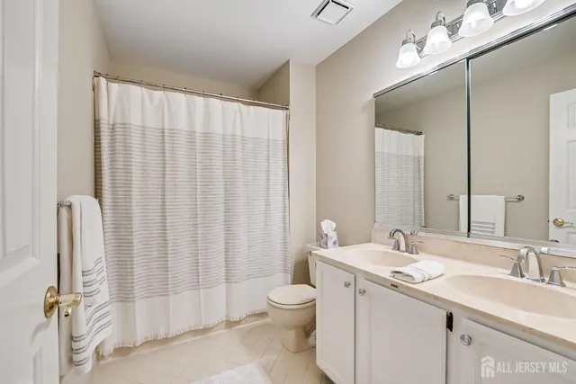 an aerial view of house with yard swimming pool and outdoor seating